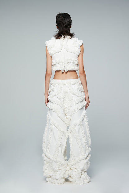 Fractional-wave pants with raw edge