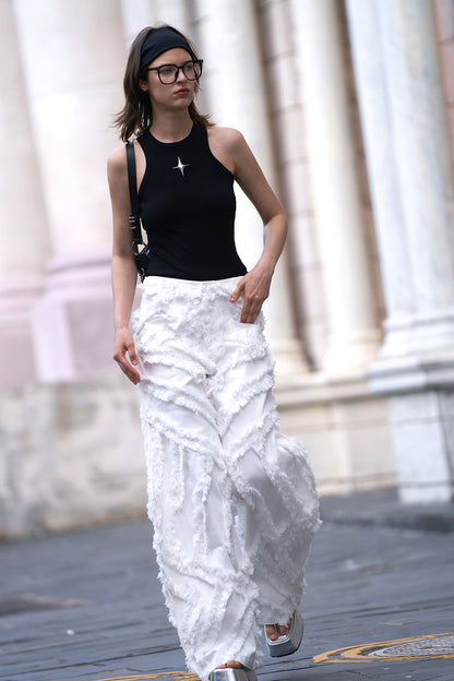 Fractional-wave pants with raw edge