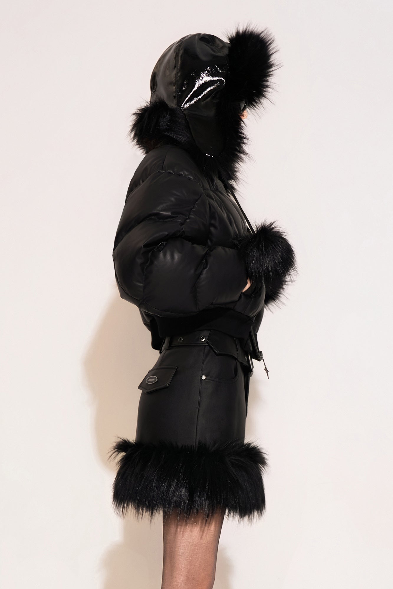 Leather quilted goose down jacket with wavy sleeves