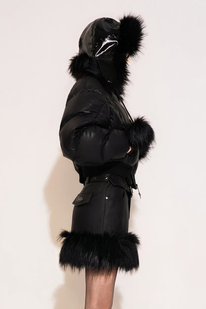 Leather quilted goose down jacket with wavy sleeves