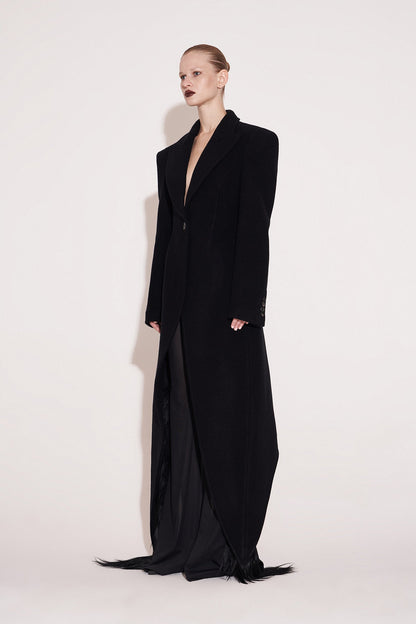Wool coat with wide shoulders and swallowtail hem