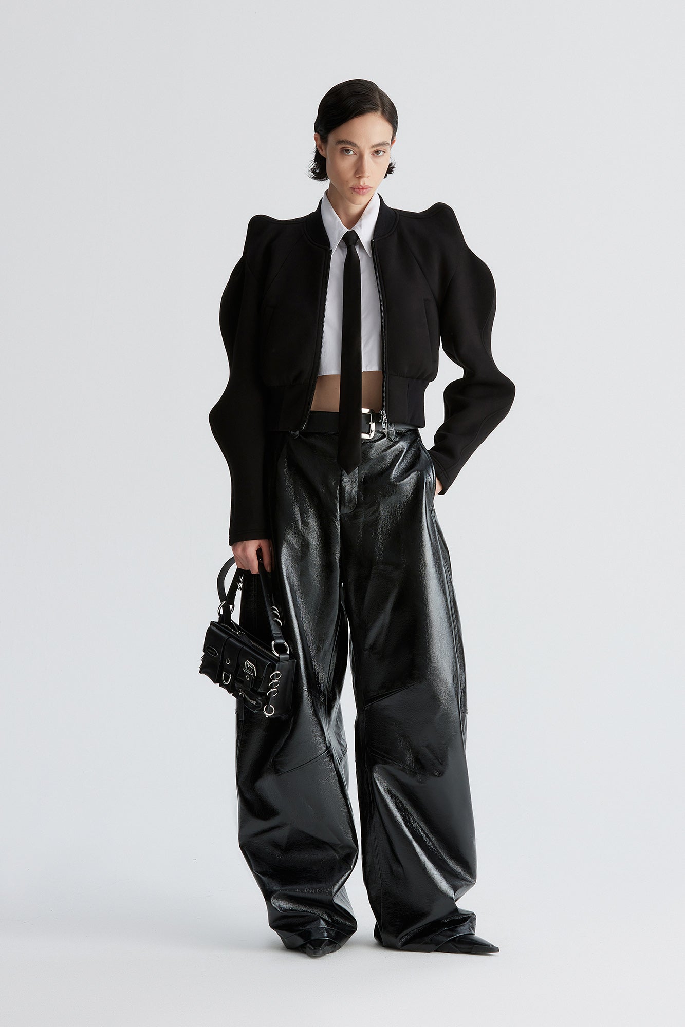 Three-dimensional upturned shoulder wavy sleeve waist-cinching coat